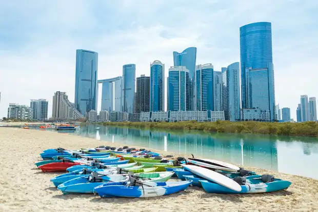 Kayaks lined up on the shore